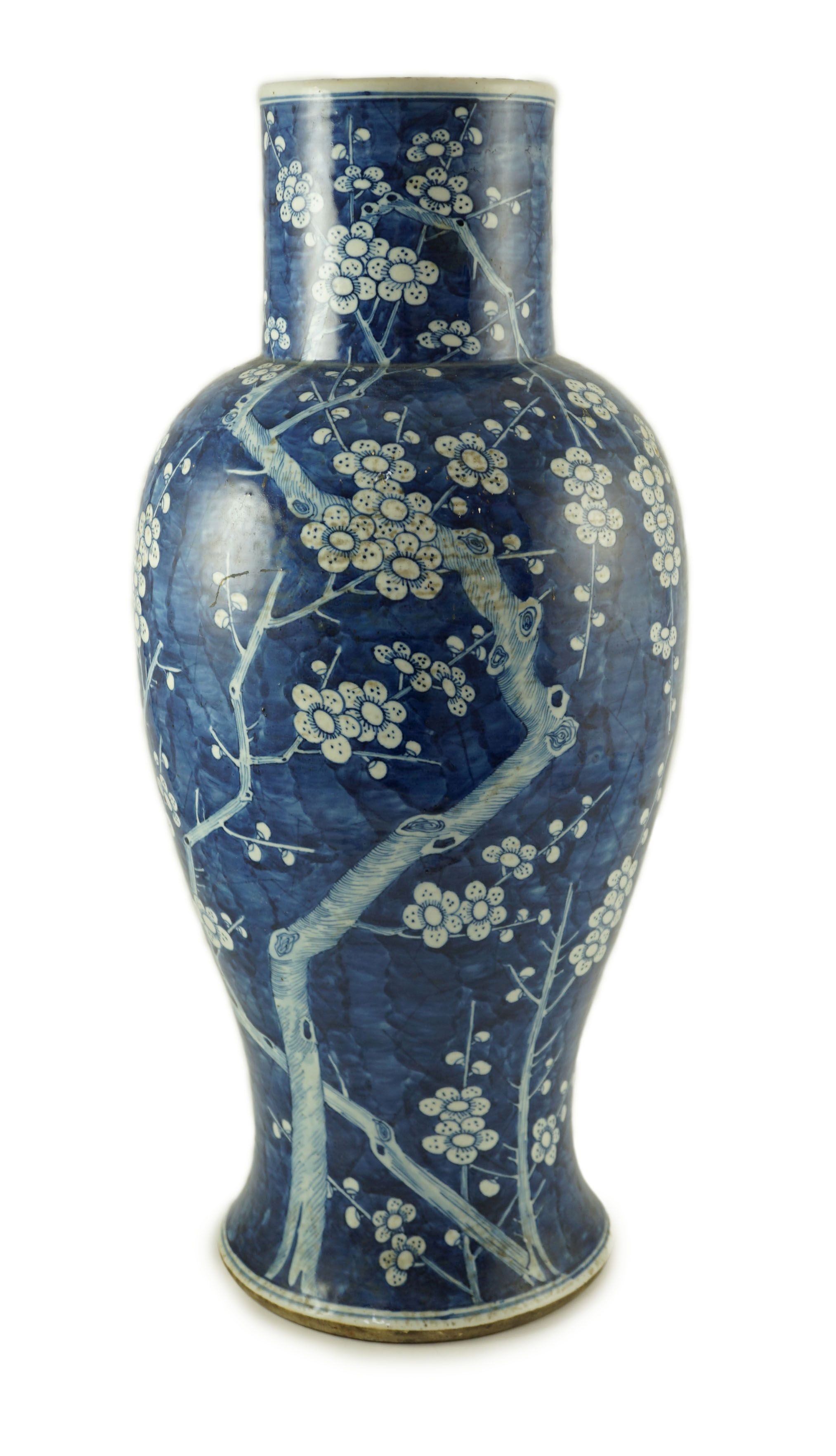 A large Chinese blue and white ‘prunus’ vase, 19th century, 55 cm high, drilled hole to base